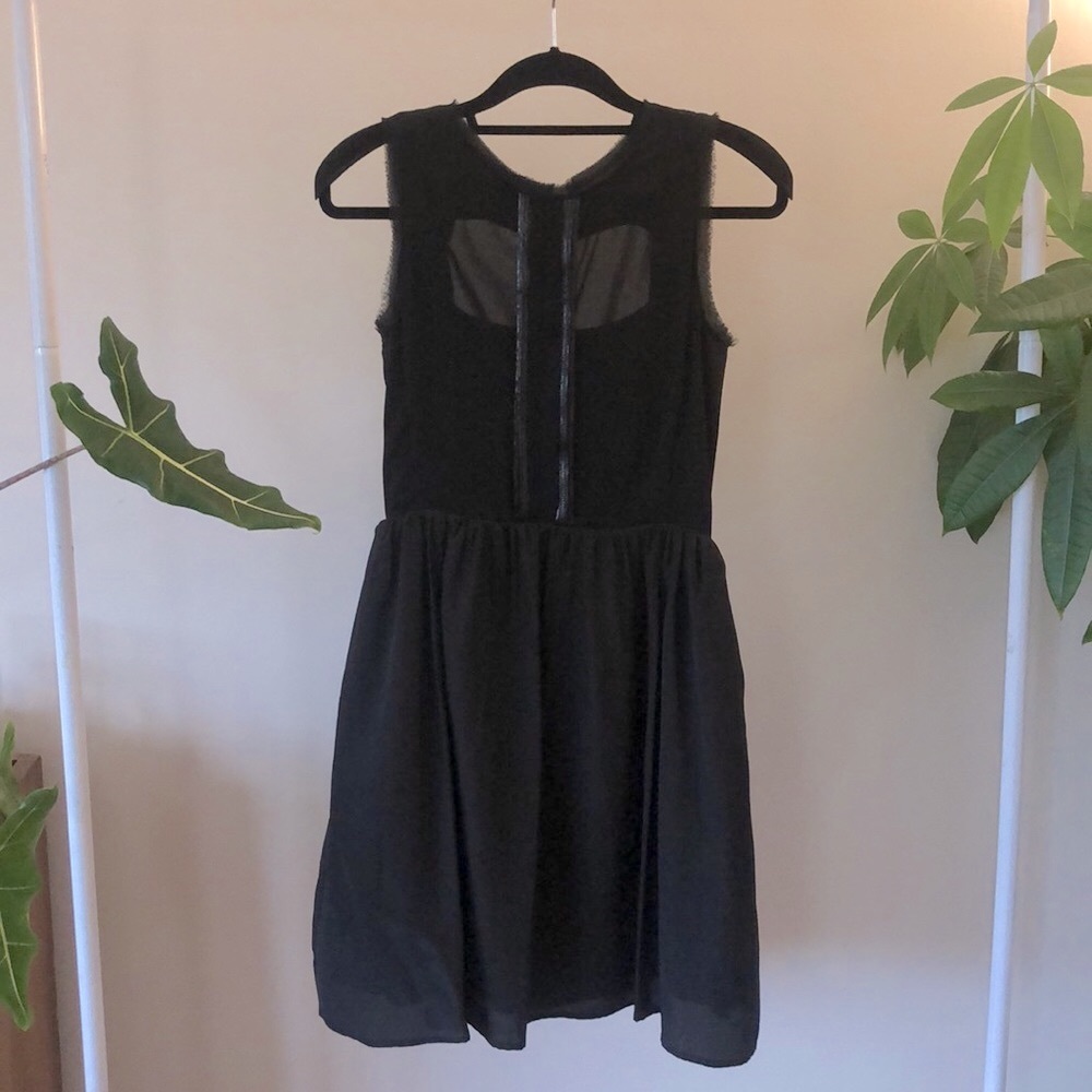 Cocktail dress with unique trim and tulle underskirt